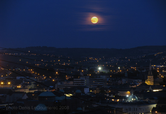 rising moon over cork city