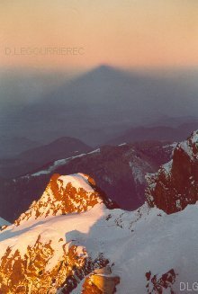 Shadow of the mountain on the mist